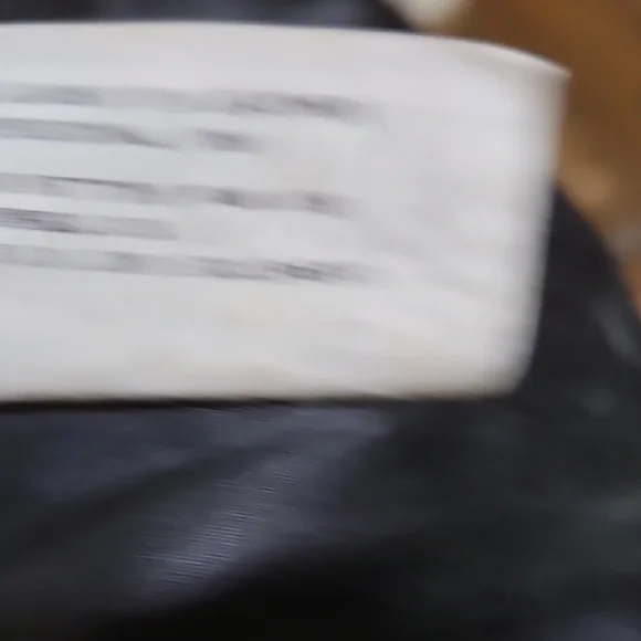 Black Leather Biker Belted Jacket with Fitted Silhouette and Diagonal Zipper - Picture 14 of 15